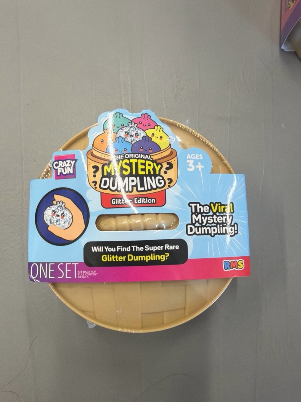 Mystery Dumpling Toy - Tan & Light Blue Packaging